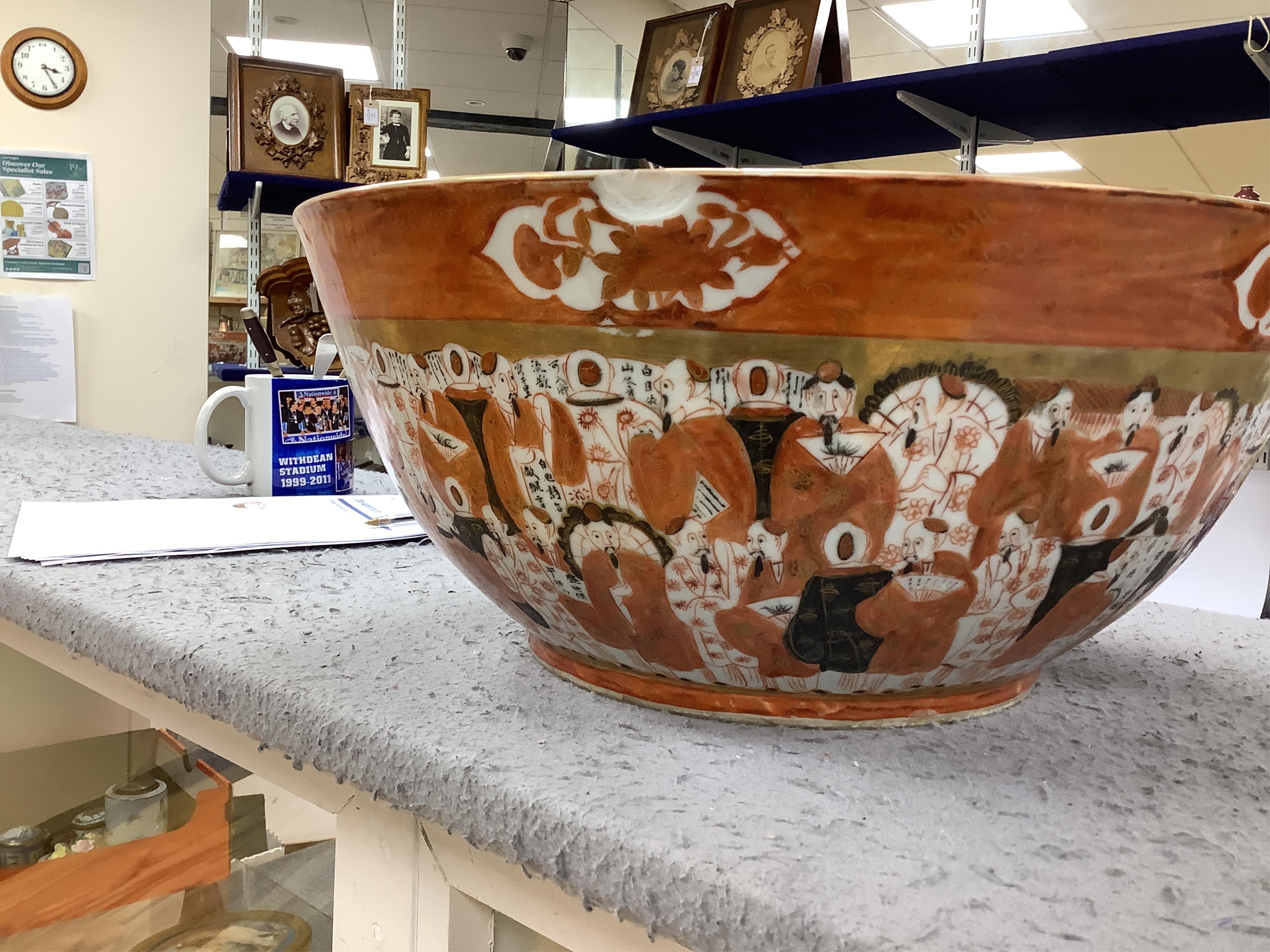A late 19th century Japanese Kutani punch bowl, 39cm diameter. Condition - fair, chipped